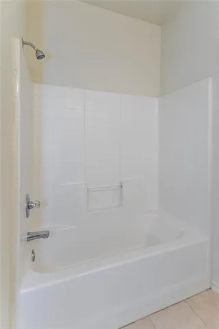 a view of a room with shelf on the wall