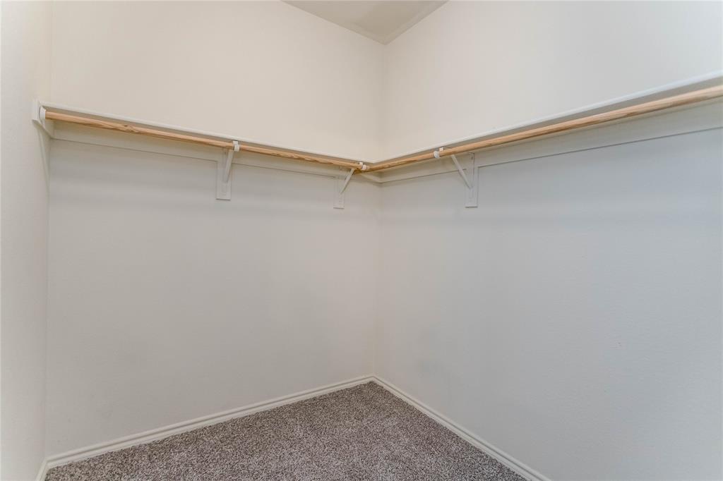 436 Blake Lane Midlothian, TX 76065 - Photo 25 of 26 a view of a room with shelf on the wall