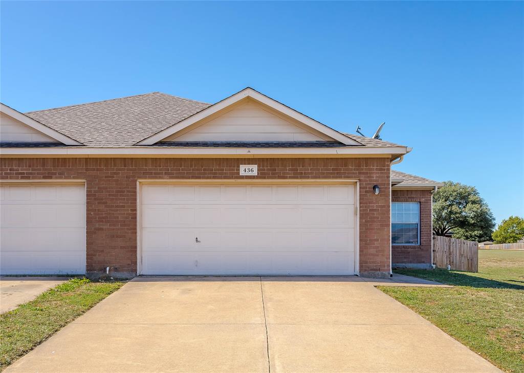 436 Blake Lane Midlothian, TX 76065 - Photo 3 of 26 a front view of a house with garage