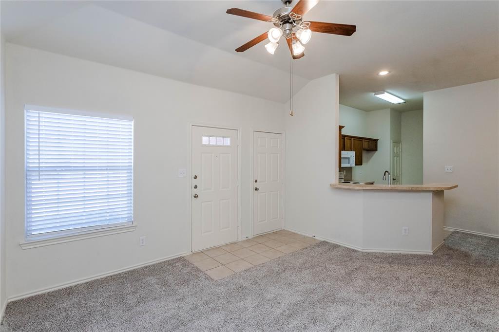 436 Blake Lane Midlothian, TX 76065 - Photo 5 of 26 a view of an empty room with a window
