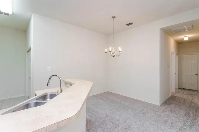 a bathroom with a sink and vanity