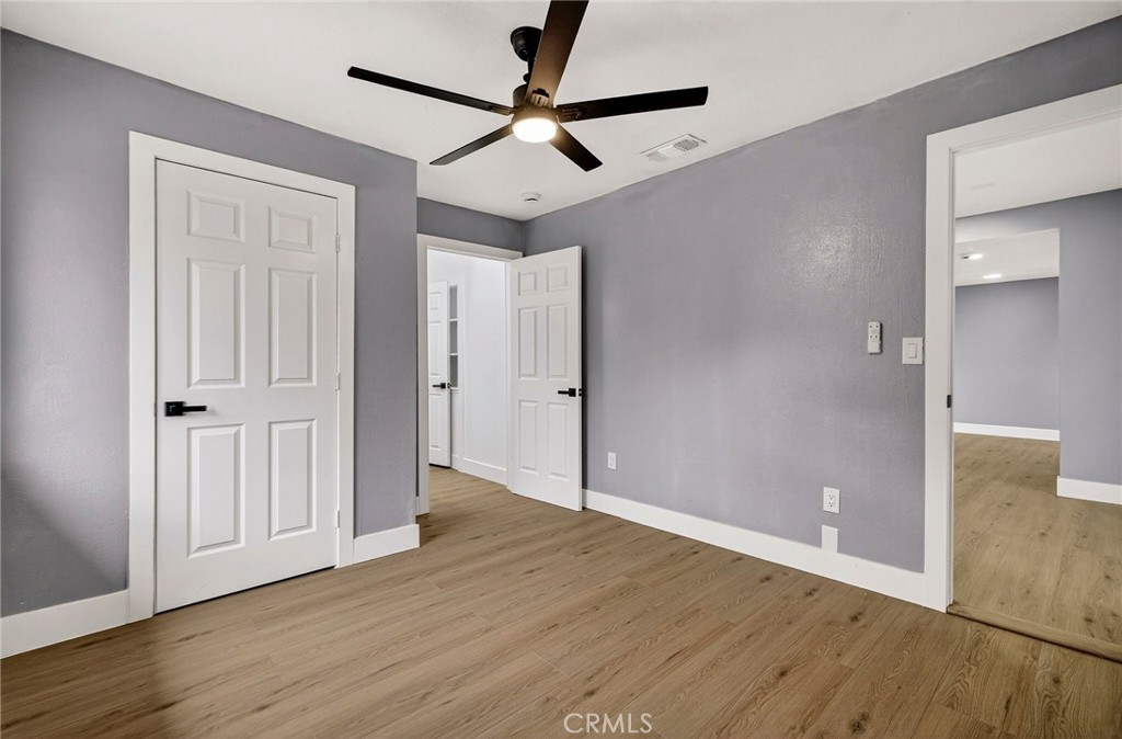 7040 Fulton Avenue Palermo, CA 95968 - Photo 23 of 53 a view of an empty room with wooden floor