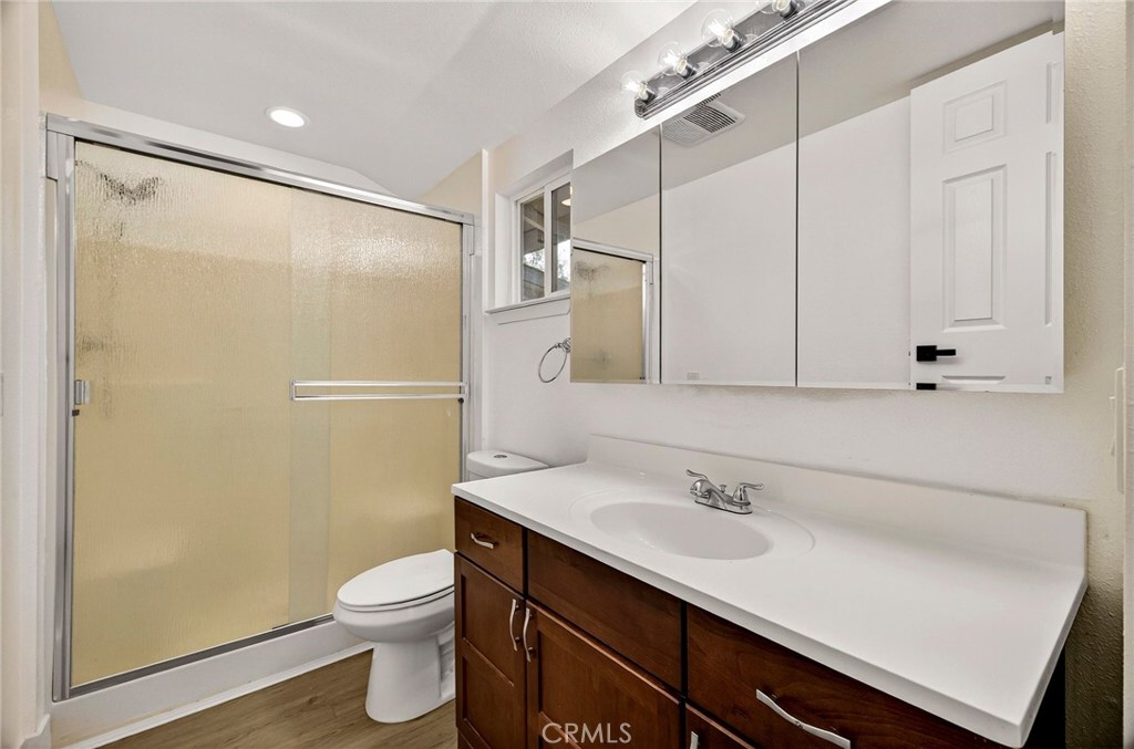 7040 Fulton Avenue Palermo, CA 95968 - Photo 28 of 53 a bathroom with a sink a toilet and shower