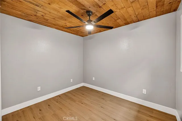 a view of a livingroom with wooden floor