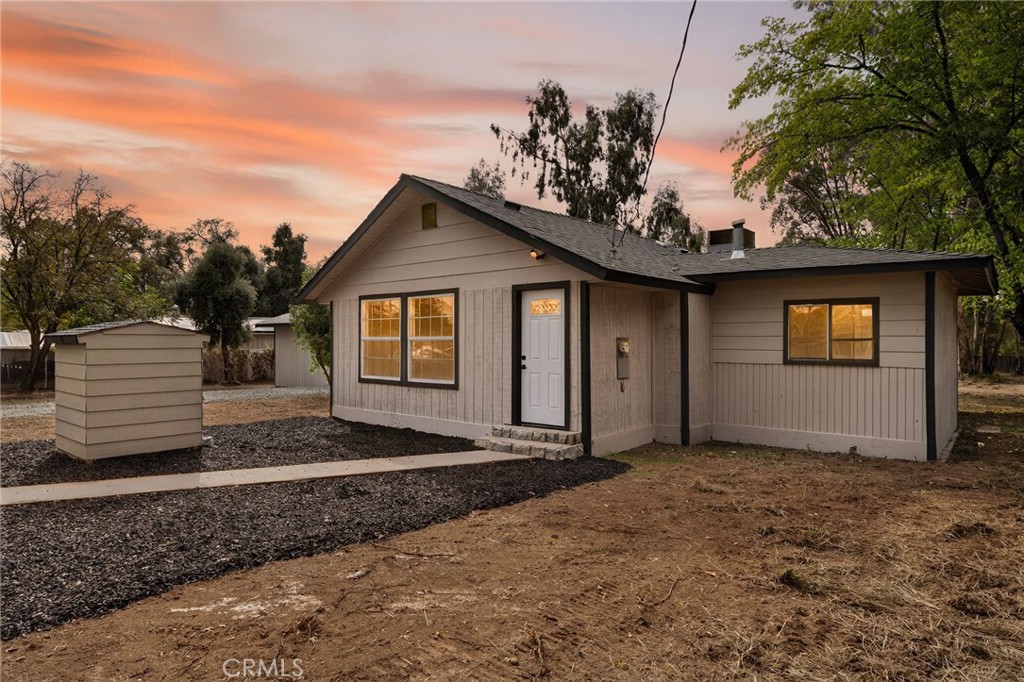 7040 Fulton Avenue Palermo, CA 95968 - Photo 3 of 53 a view of a house with a yard and potted plants