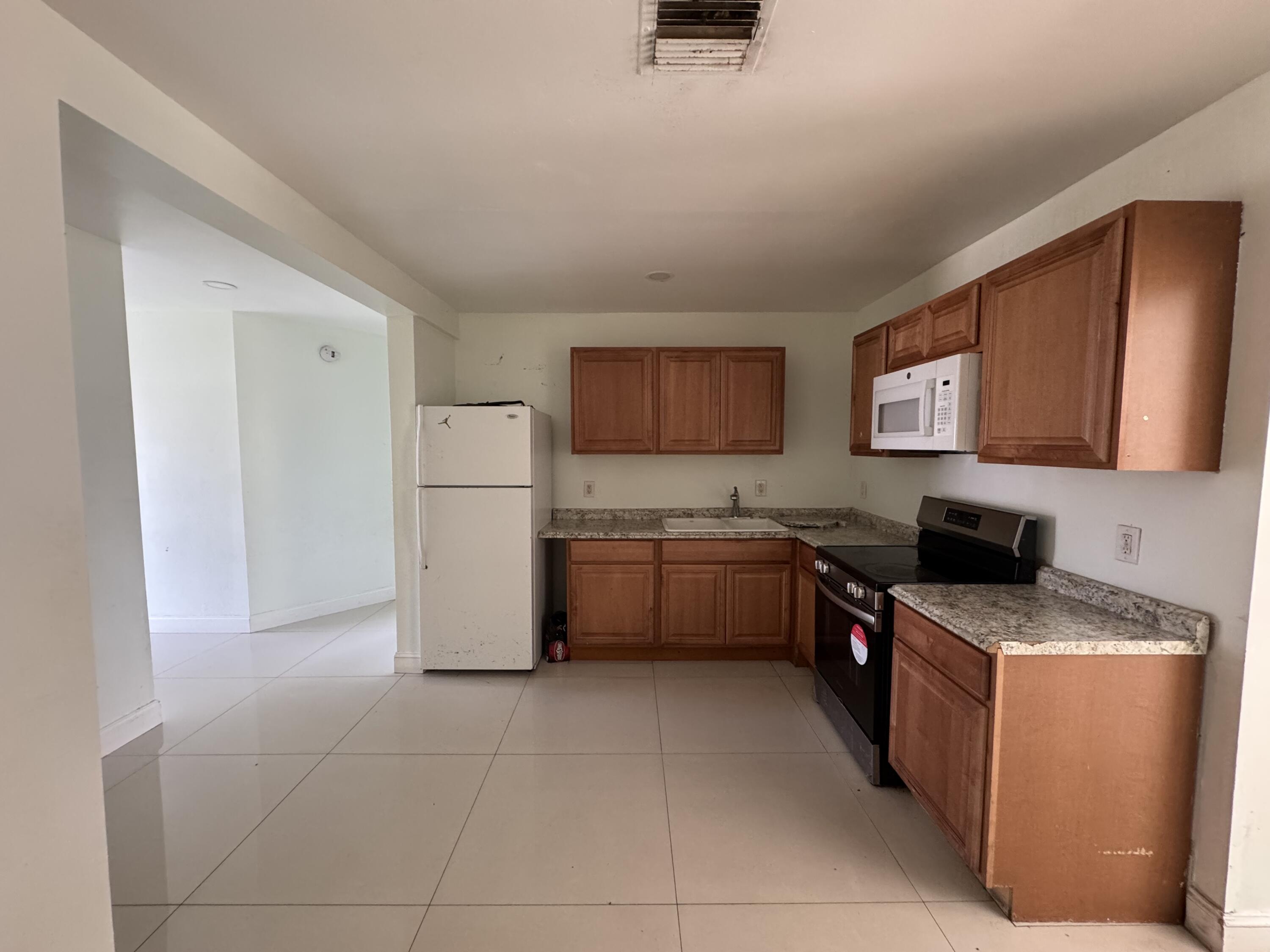 616 49th Street West Palm Beach, FL 33407 - Photo 2 of 9 IMG_0329