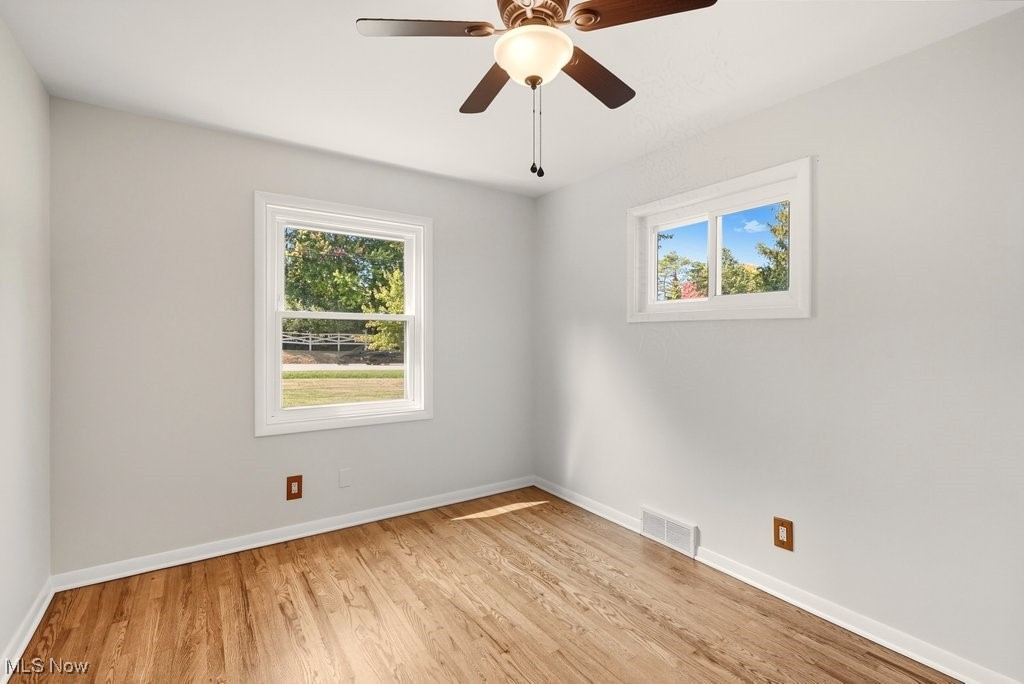 181 Boston Mills Road Hudson, OH 44236 - Photo 22 of 33 Spare room featuring light wood-type flooring and ceiling fan