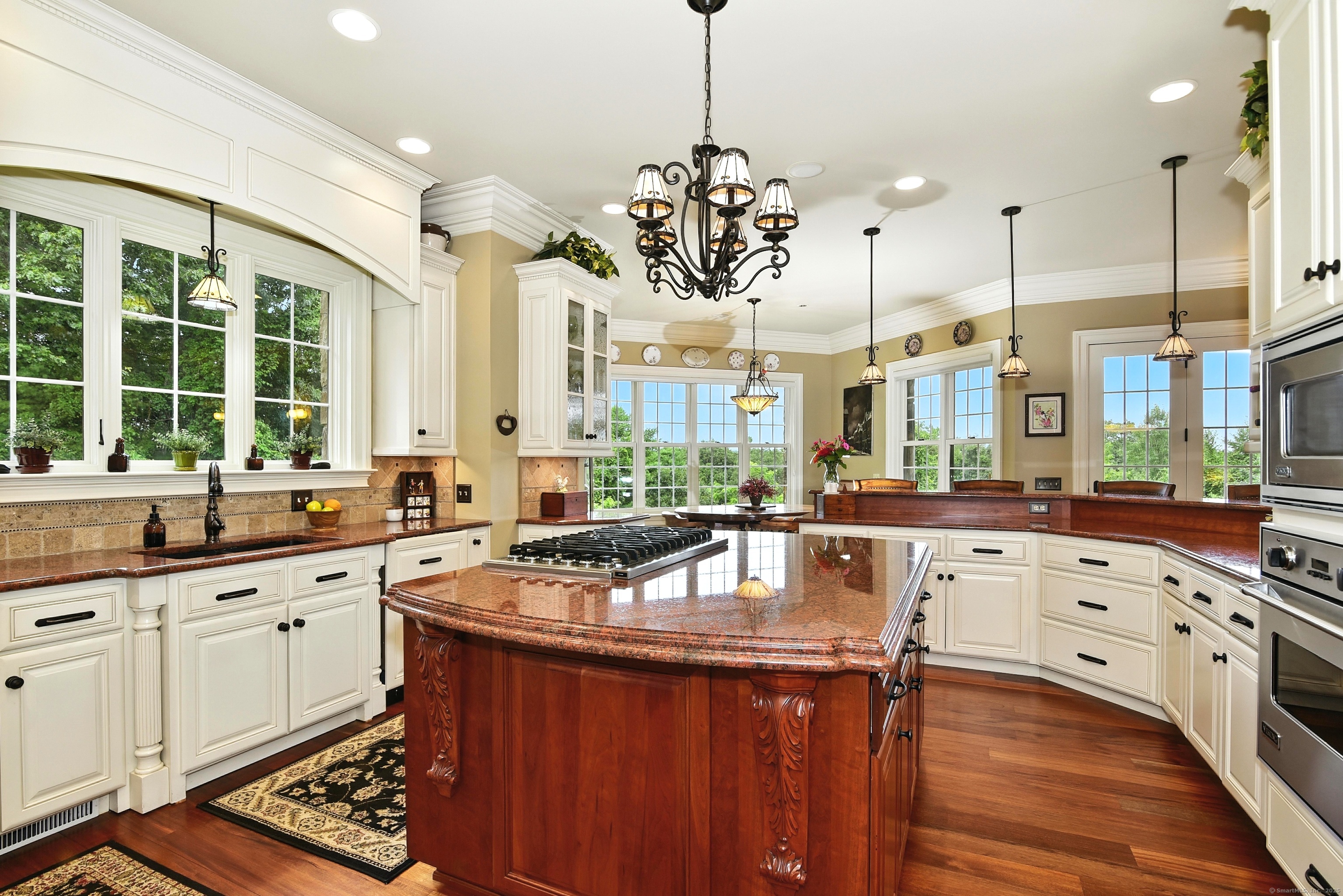 282 Searles Road Pomfret, CT 06259 - Photo 22 of 40 Airy 10-foot ceiling. The exceptional chef's kitchen is equipped with Viking and Meile appliances, including an integrated dishwasher.