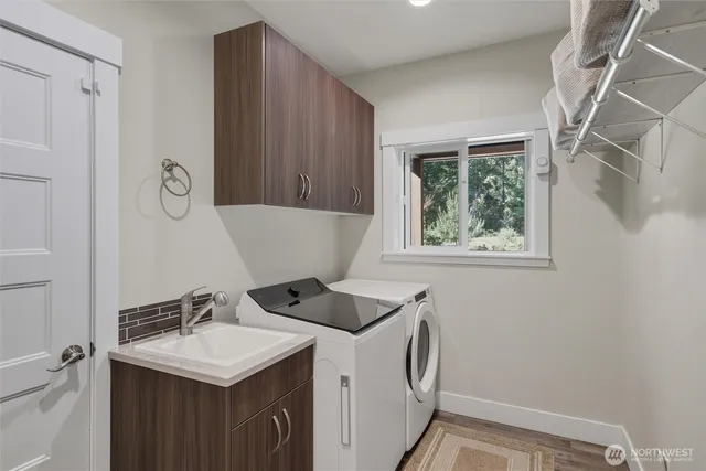 a bathroom with a sink and mirror
