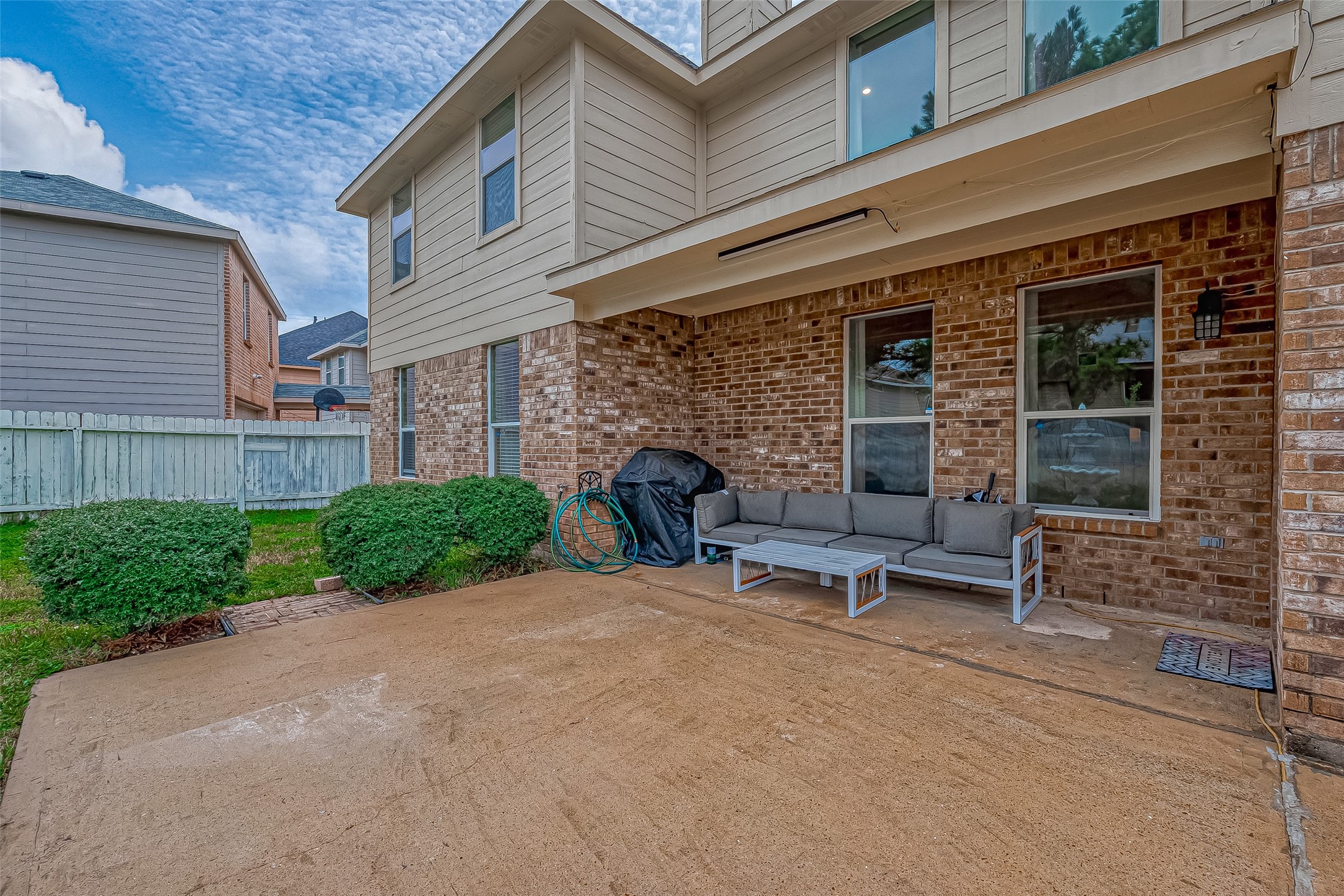 22922 Montclair Park Lane Spring, TX 77373 - Photo 43 of 46 a view of a patio with a table and chairs and potted plants