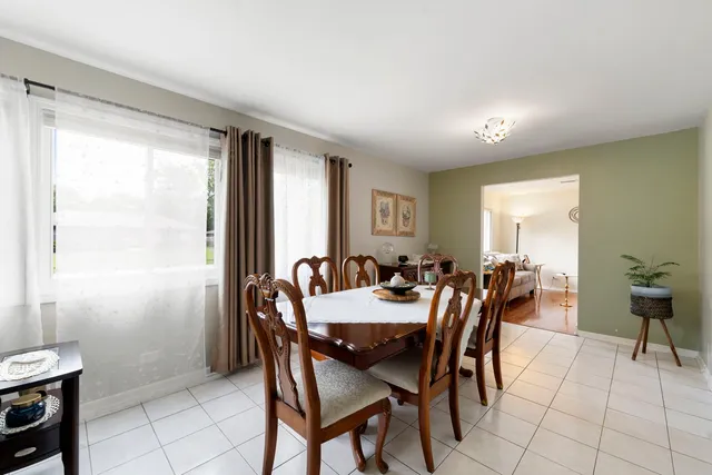 a kitchen with stainless steel appliances a stove a refrigerator and cabinets