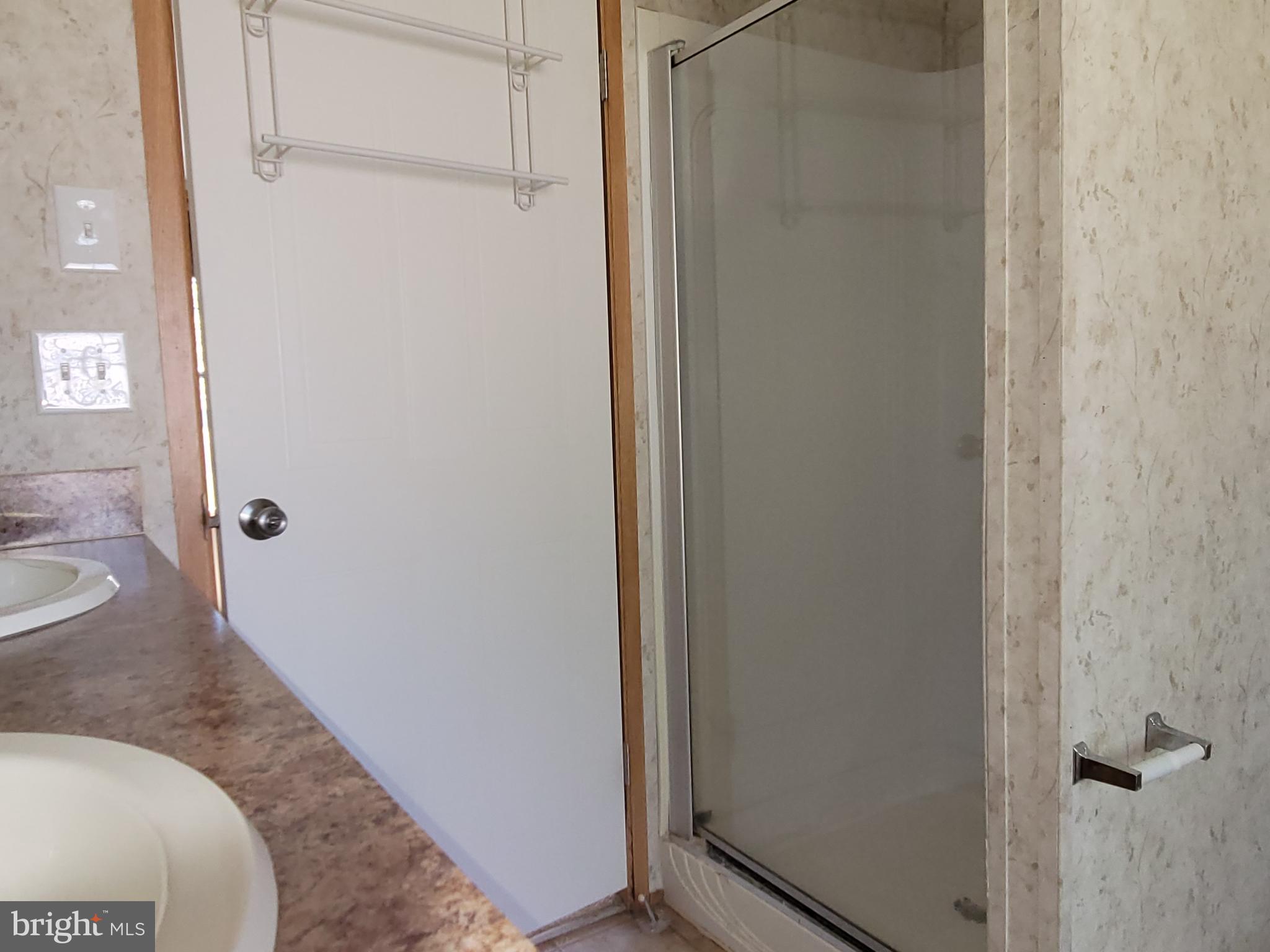 193 Shawnee Avenue Dover, PA 17315 - Photo 11 of 20 a bathroom with a granite countertop sink and a mirror