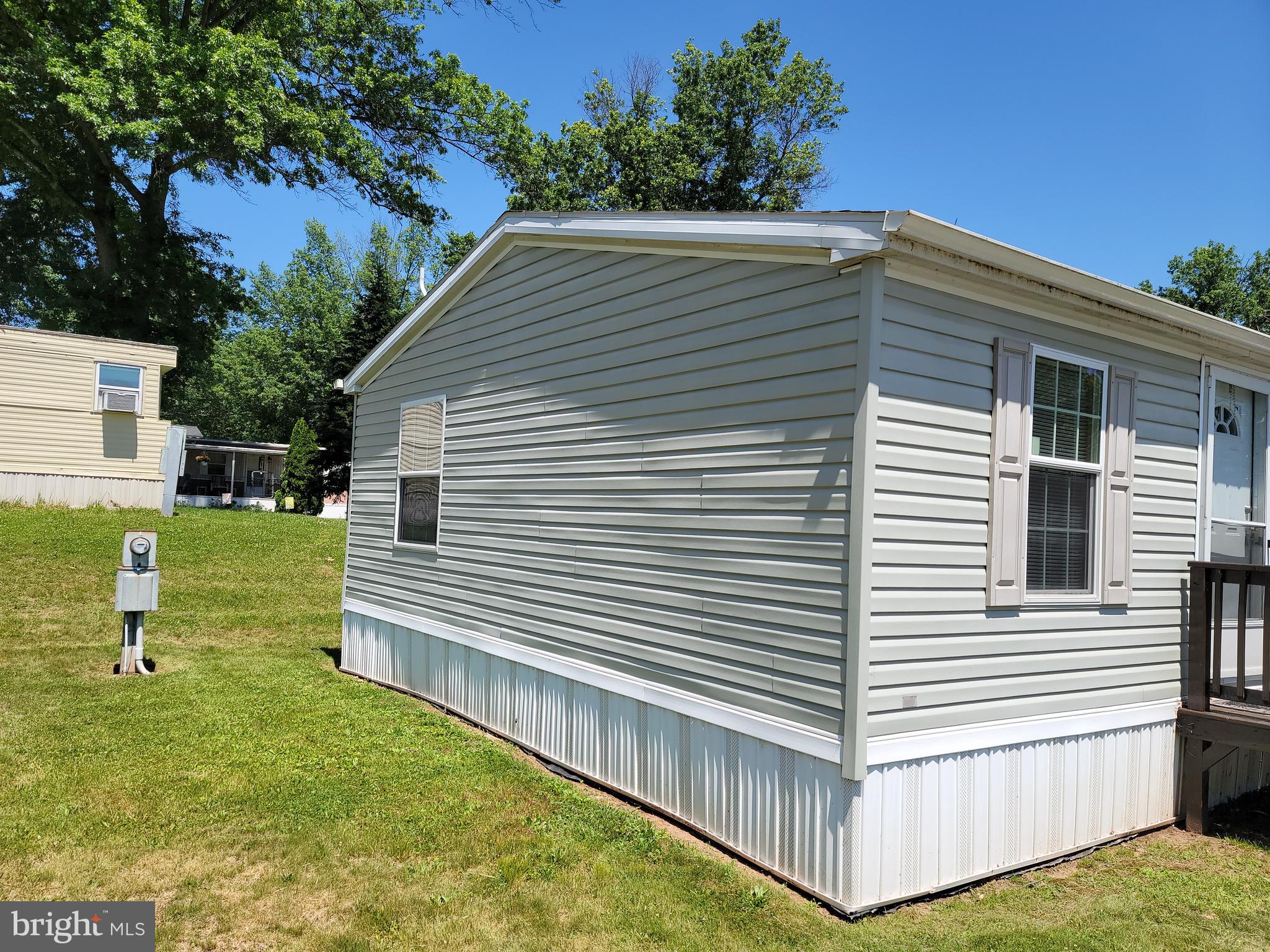 193 Shawnee Avenue Dover, PA 17315 - Photo 3 of 20 a backyard of a house with seating space