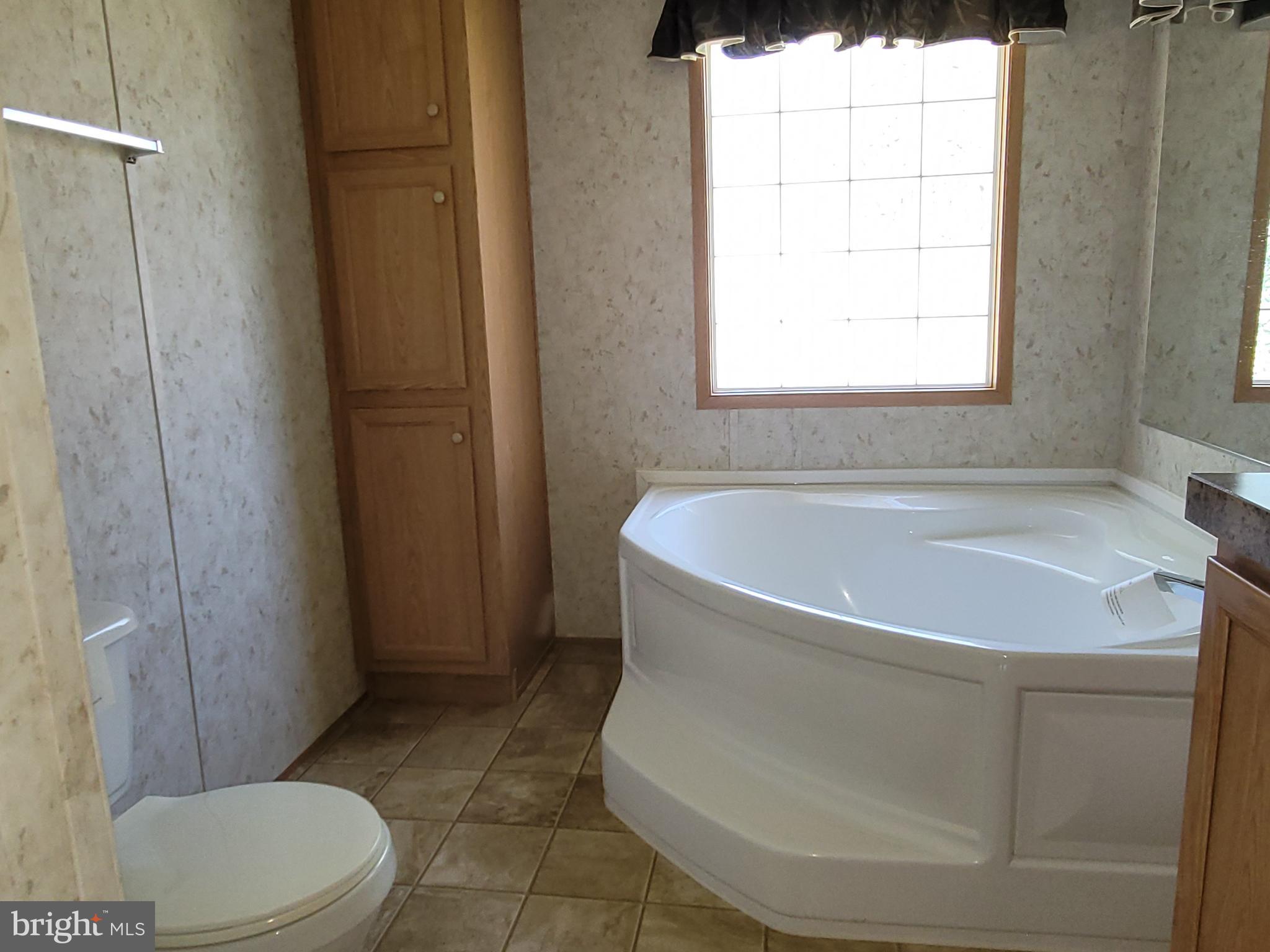 193 Shawnee Avenue Dover, PA 17315 - Photo 10 of 20 a white bath tub sitting next to a toilet