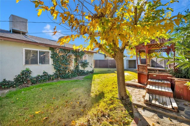 a view of a swimming pool with a patio