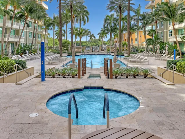a view of a swimming pool with a patio