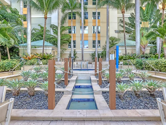 a view of outdoor space with swimming pool and lounge chair
