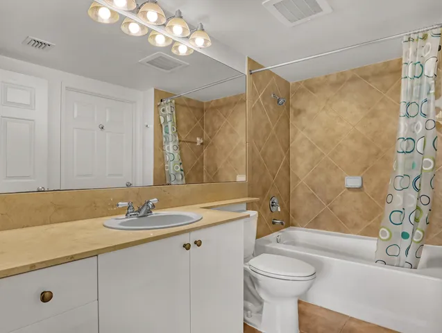 a view of swimming pool with a yard