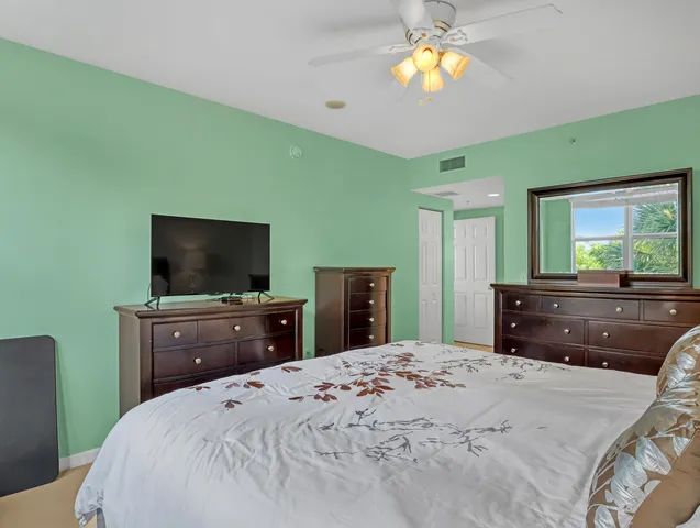 a kitchen with a sink and a refrigerator