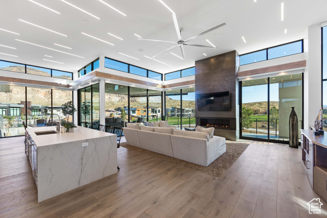3558 South Cypress Road Hurricane, UT 84737 - Photo 4 of 57 Living room with plenty of natural light and light hardwood / wood-style flooring