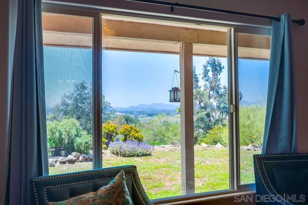 460 Pile Street Ramona, CA 92065 - Photo 5 of 25 a view of a room with a large window and dining room