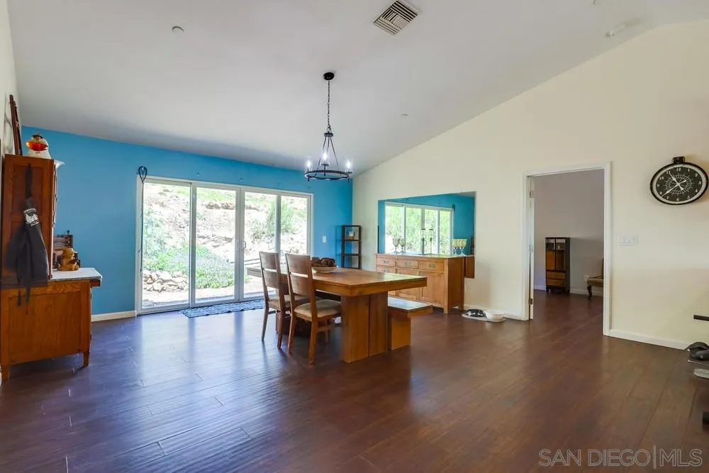 460 Pile Street Ramona, CA 92065 - Photo 7 of 25 a view of a dining room with furniture window and wooden floor