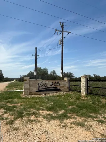 a view of a lake with a big yard