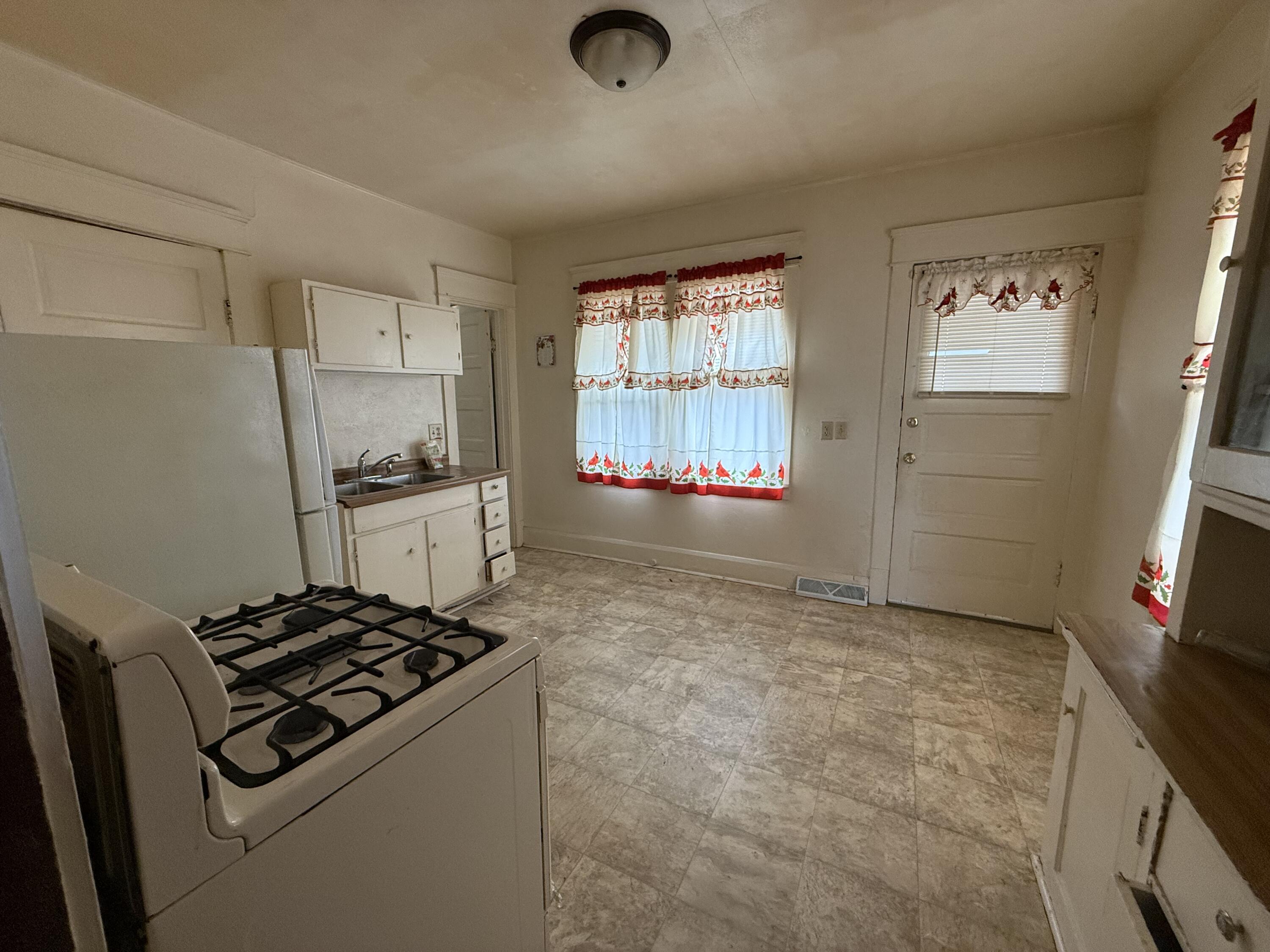 2619 West High Street Racine, WI 53404 - Photo 2 of 12 Lower Kitchen