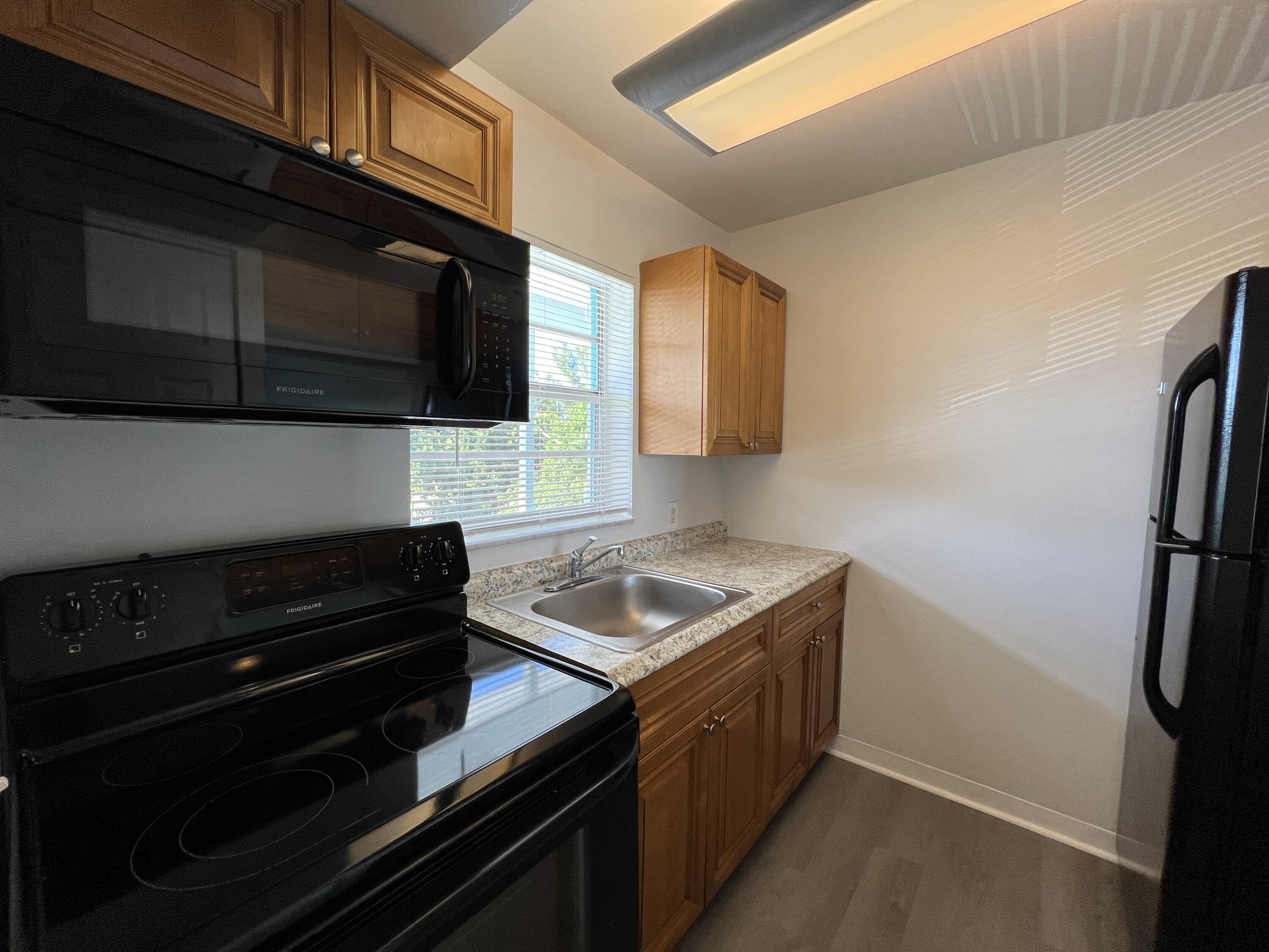 1887 Juno Road, Unit 2 Juno Beach, FL 33408 - Photo 5 of 16 IMG_2575