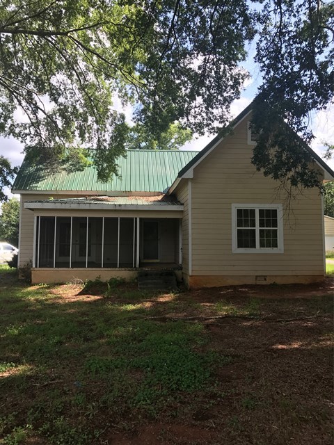 195 Joe Chambers Road Forsyth, GA 31029 - Photo 1 of 9 a front view of a house with a yard