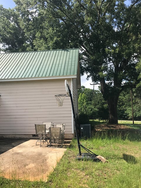 195 Joe Chambers Road Forsyth, GA 31029 - Photo 2 of 9 a view of swimming pool with a patio