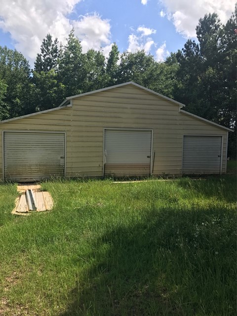 195 Joe Chambers Road Forsyth, GA 31029 - Photo 5 of 9 a view of a backyard