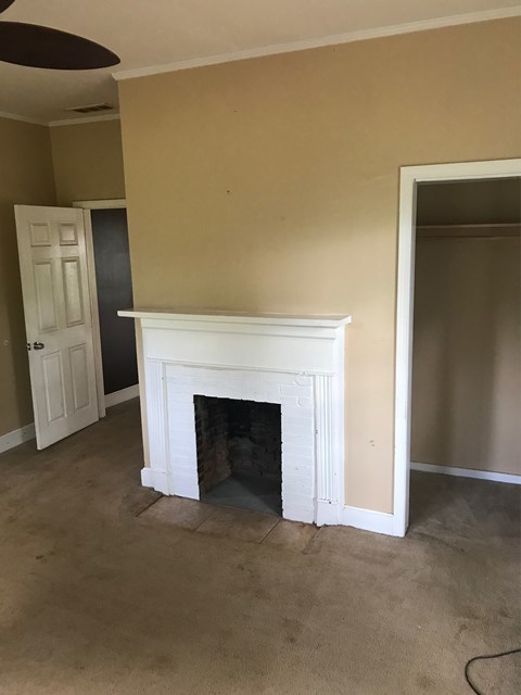 195 Joe Chambers Road Forsyth, GA 31029 - Photo 7 of 9 a view of a livingroom with a fireplace