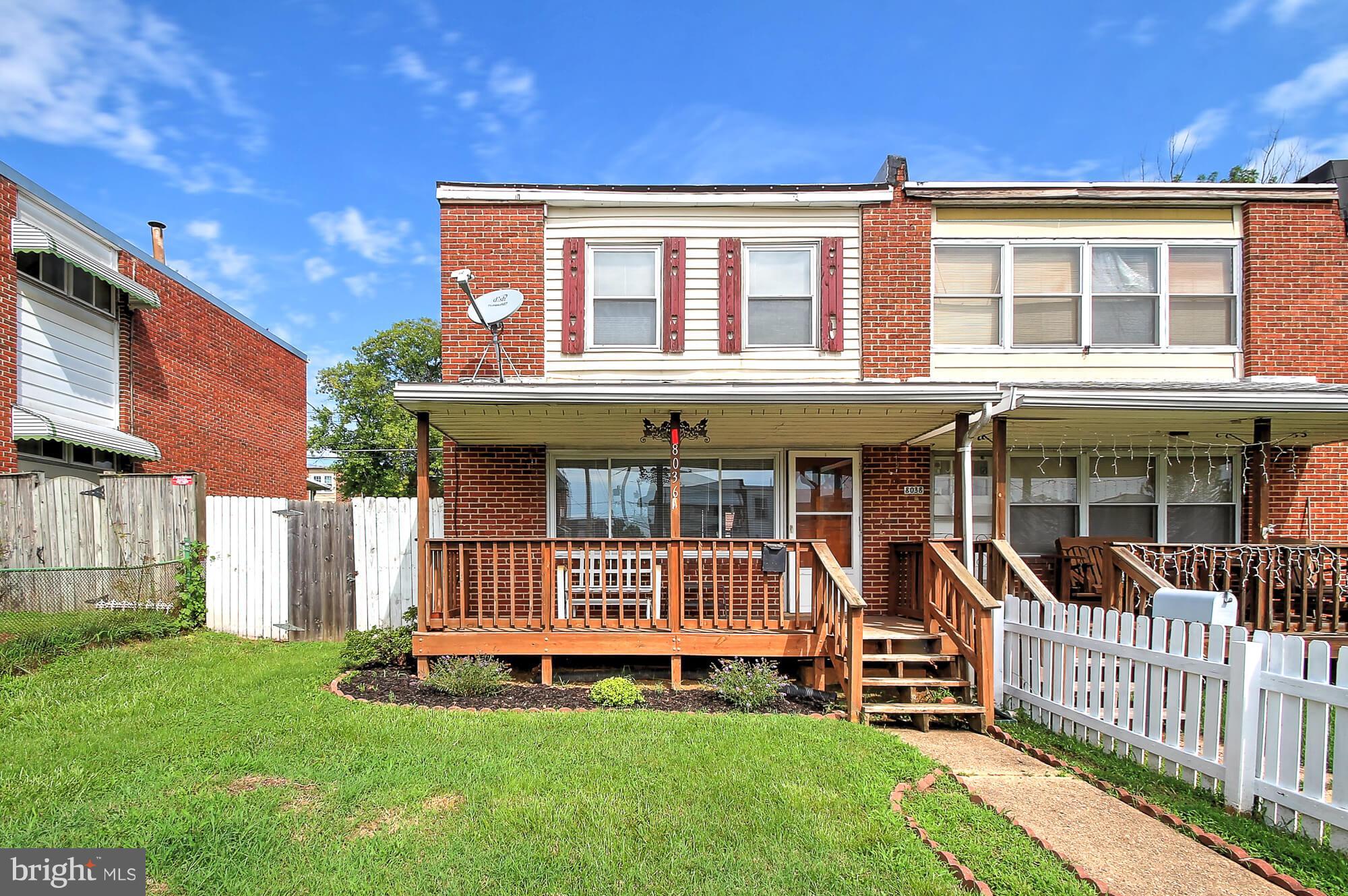 8036 Wynbrook Road Baltimore, MD 21224 - Photo 27 of 30 a front view of a house with a yard