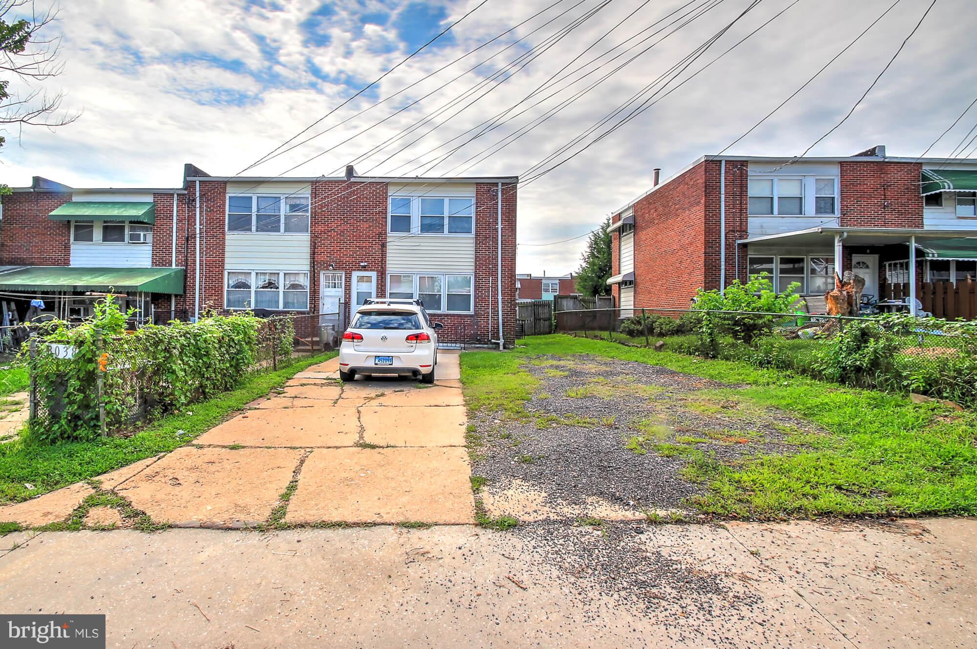 8036 Wynbrook Road Baltimore, MD 21224 - Photo 30 of 30 a front view of a building with garden