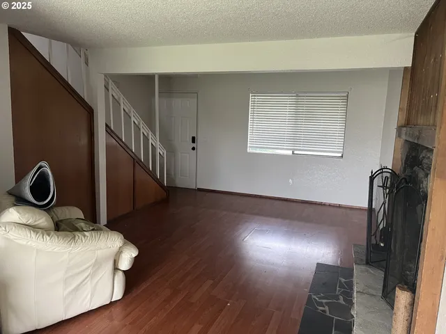 a view of entryway with wooden floor