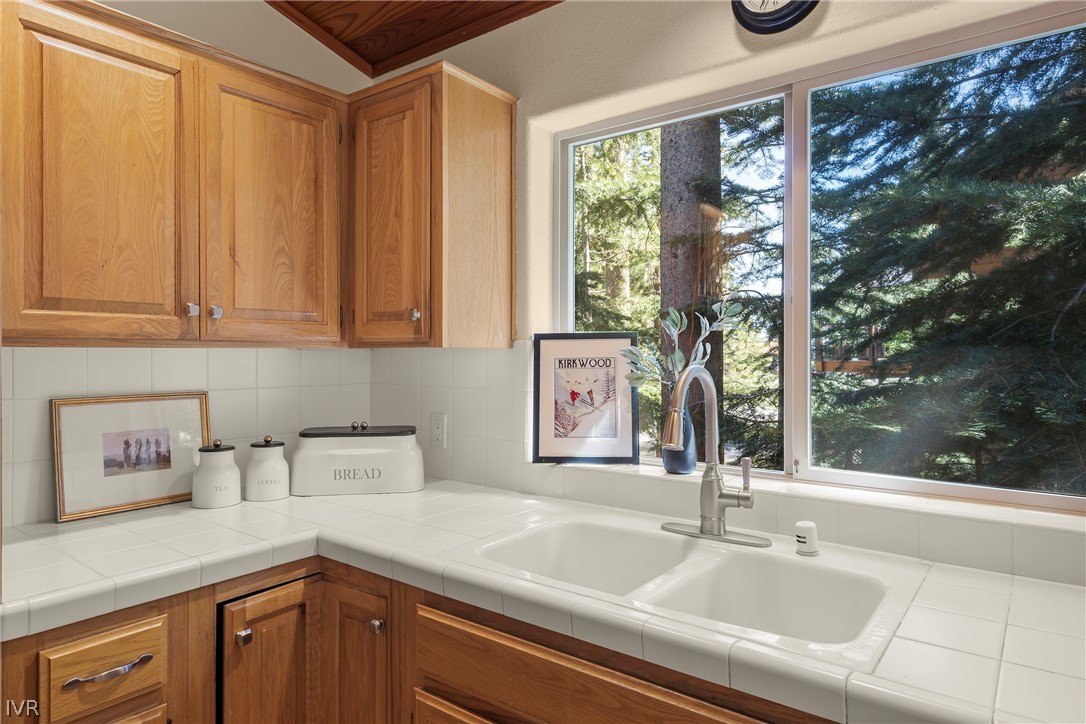 858 Jennifer Street Incline Village, NV 89451 - Photo 14 of 44 a kitchen with a sink and a large window