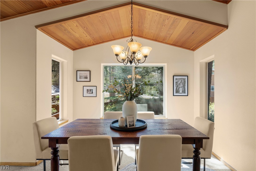 858 Jennifer Street Incline Village, NV 89451 - Photo 17 of 44 a view of a dining room with furniture and chandelier