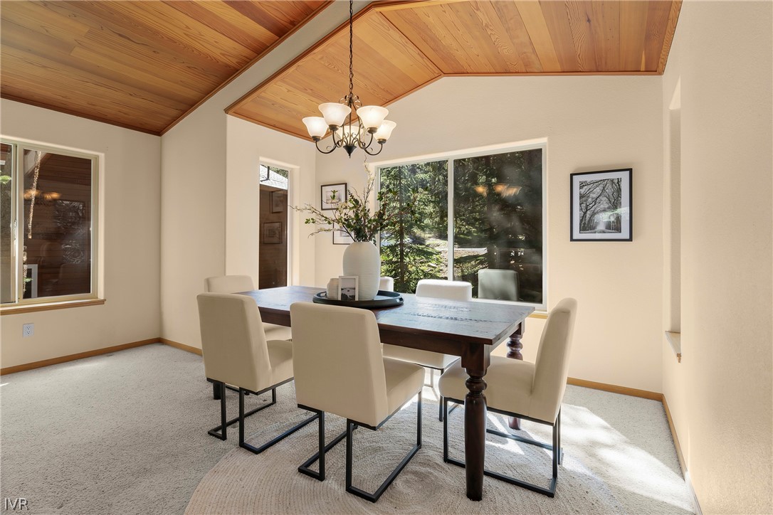 858 Jennifer Street Incline Village, NV 89451 - Photo 18 of 44 a view of a dining room with furniture window and outside view