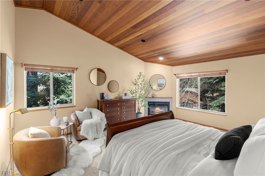 858 Jennifer Street Incline Village, NV 89451 - Photo 20 of 44 a bedroom with a large bed and a large window