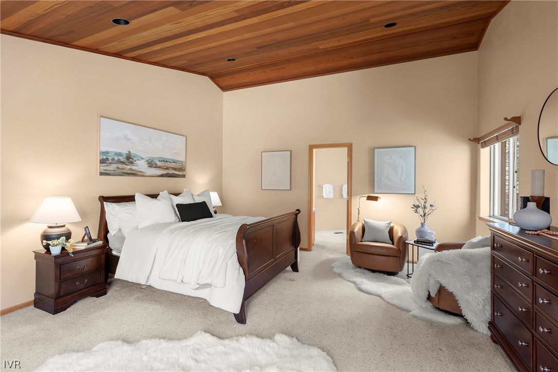 858 Jennifer Street Incline Village, NV 89451 - Photo 21 of 44 a spacious bedroom with a bed and window