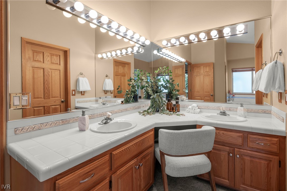 858 Jennifer Street Incline Village, NV 89451 - Photo 22 of 44 a bathroom with a sink and a mirror