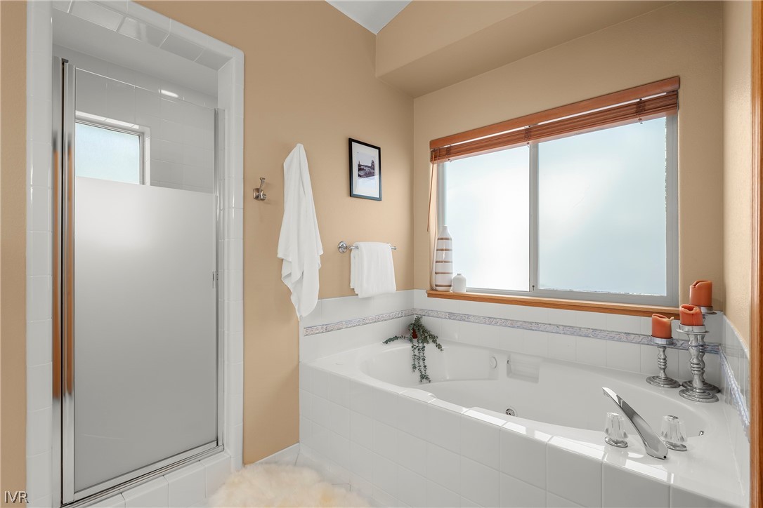 858 Jennifer Street Incline Village, NV 89451 - Photo 23 of 44 a bathroom with a bathtub and a sink