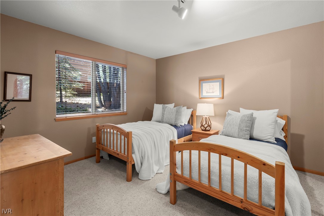 858 Jennifer Street Incline Village, NV 89451 - Photo 25 of 44 a bedroom with two beds and a window