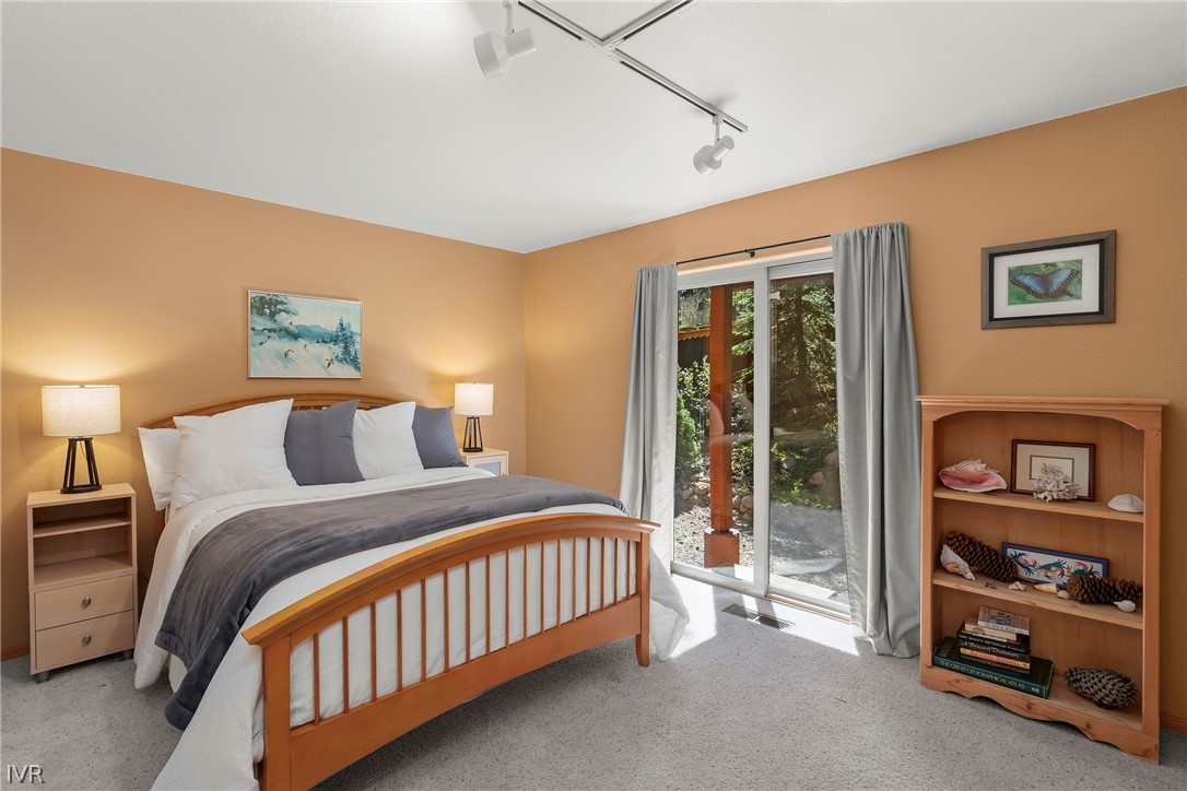 858 Jennifer Street Incline Village, NV 89451 - Photo 27 of 44 a bedroom with a bed and a window