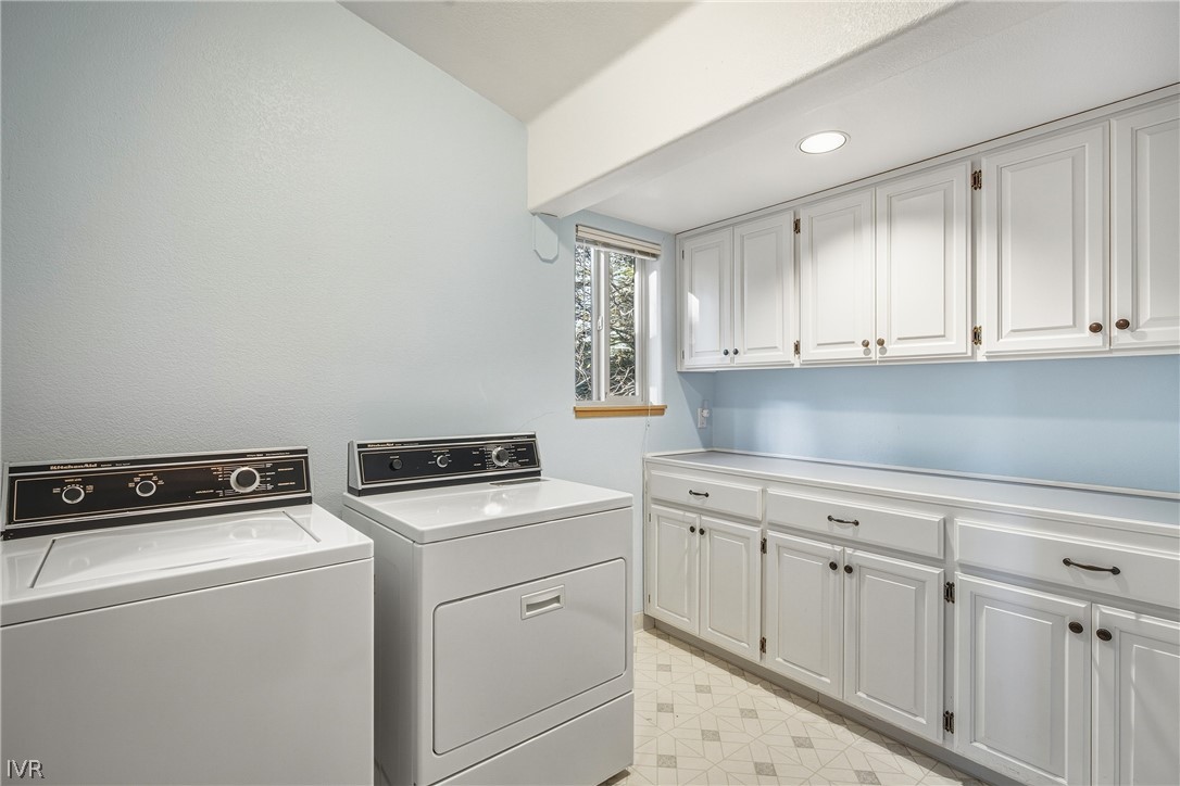 858 Jennifer Street Incline Village, NV 89451 - Photo 29 of 44 a kitchen with white cabinets and white appliances