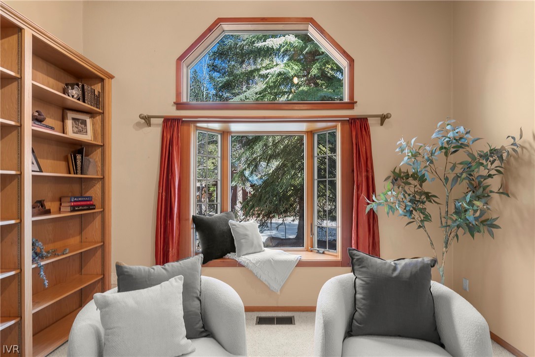 858 Jennifer Street Incline Village, NV 89451 - Photo 3 of 44 a living room with a large window and a potted plant