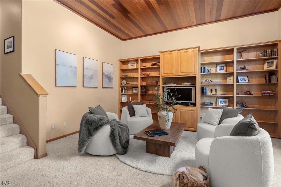 858 Jennifer Street Incline Village, NV 89451 - Photo 4 of 44 a living room with furniture a rug and a book shelf