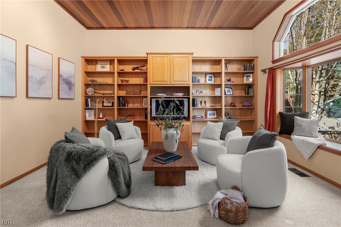 858 Jennifer Street Incline Village, NV 89451 - Photo 5 of 44 a living room with furniture a fireplace and a large window