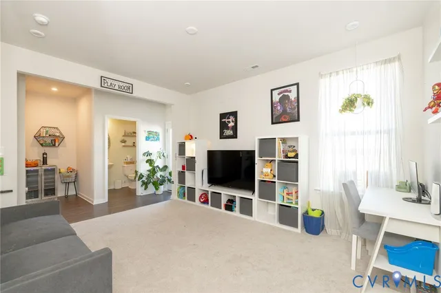 a bedroom with a bed furniture and a window